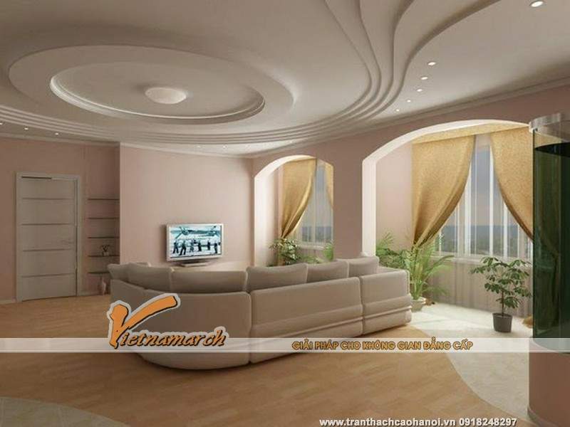 Phòng khách được thiết kế bằng trần thạch cao và đèn led âm trần